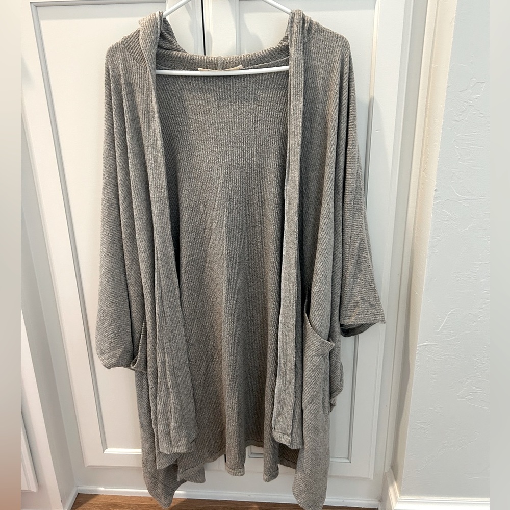 Three Bird Nest. Oversized Hooded Poncho. Greyish/light brown color.